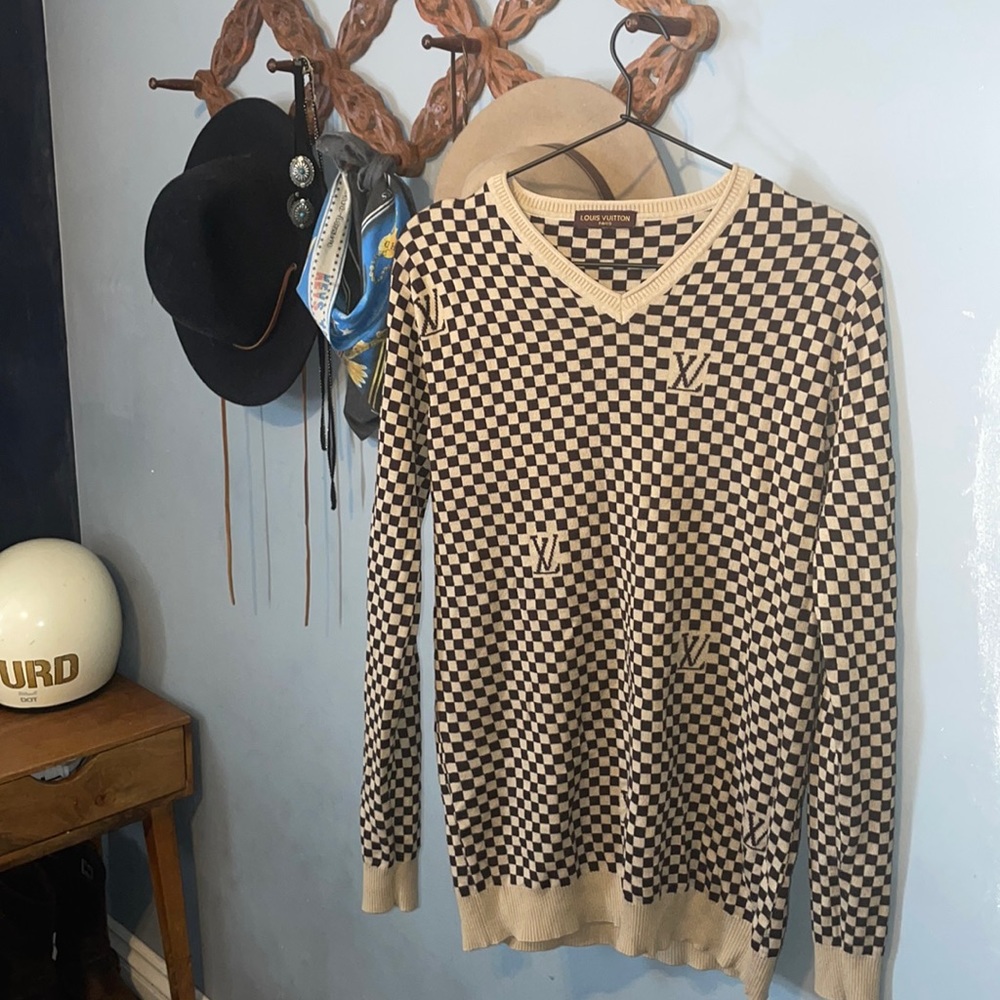 Louis Vuitton brown checkered fleece sweater.